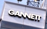 GANNETT EARNS